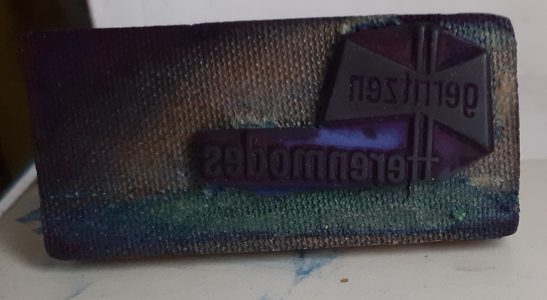 Het winkelstempel met logo van Gerritzen.